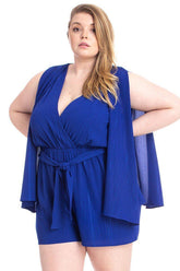 Royal blue plus size romper with wrap front, tie waist, and flowing sleeves for women