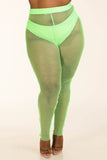 Neon green plus size fishnet leggings with high waist, styled with clear heels for bold fashion look