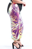 Holographic plus size jogger pants with iridescent metallic sheen, paired with black heels