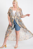Plus size woman in paisley kimono over denim shorts and heels